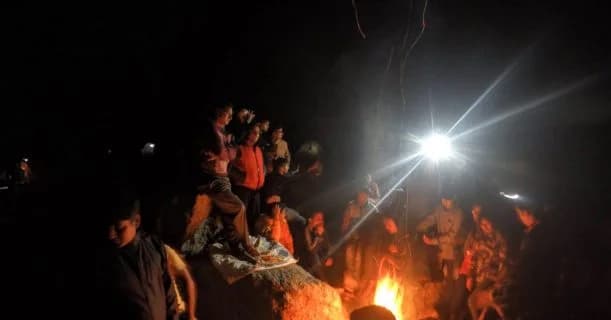 Bonfire and friends at campsite